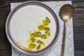 Traditional Spanish dish, cold soup ajo blanco or ajoblanco from garlic, almonds, white wine vinegar, olive oil and grapes Royalty Free Stock Photo