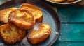 Traditional Spanish Easter dessert torrijas French toast with cinnamon and honey. Holiday treat eaten on Holy week