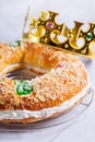 Traditional Spanish Epiphany cake, Roscon de Reyes with festive decorations