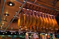 Traditional Spanish jamon ham for sale at the market on the La Boqueria Market in Barcelona, Spain. High quality photo Royalty Free Stock Photo
