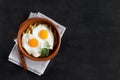 Traditional spanish lunch - fried eggs with french fries, cured pork slices jamon. Copy space for text