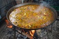 Traditional Spanish paella beeing prepared fresh, at a beach restaurant at the Costa del Sol resort of Nerja Royalty Free Stock Photo