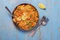 Traditional spanish paella dish with seafood, peas, rice and chicken Royalty Free Stock Photo