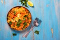 Traditional spanish paella dish with seafood, peas, rice and chicken Royalty Free Stock Photo