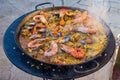 Traditional Spanish paella with seafood and chicken in a pan Royalty Free Stock Photo