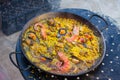 Traditional Spanish paella with seafood and chicken in a pan Royalty Free Stock Photo