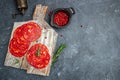 Traditional spanish sausage chorizo on a wooden board. banner, menu, recipe place for text, top view Royalty Free Stock Photo