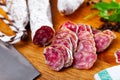 Traditional spanish thin salami sausage Fuet, sliced Royalty Free Stock Photo