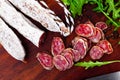 Traditional spanish thin salami sausage Fuet, sliced Royalty Free Stock Photo