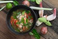 Traditional spicy prawn soup with galangal, lemongrass, kaffir lime leaf and straw mushrooms Royalty Free Stock Photo