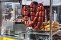 Traditional spicy Turkish sausages preparing on a grill with bread in Orange Blossom Carnival in Adana-Turkey