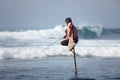 Traditional Sri Lanka: stilt fishing in ocean surf