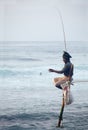 Traditional Sri Lanka: stilt fishing in ocean surf