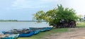 Traditional Sri Lankan Oruwa fishing boats lined in lakeshore Royalty Free Stock Photo