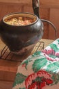 Traditional stew meal with handmade embroidery