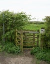 Traditional stile gate through farmland on a public footpath, Goulceby, Louth, UK. April 12, 2024. Royalty Free Stock Photo