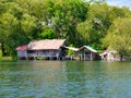 A traditional stilted house on a river in a remote rural location in Koh Kong Province in Cambodia