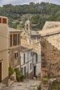 Traditional stone alley and church in Bunyola, Mallorca, Spain