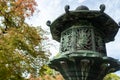 Traditional stone carved japanese lantern Toro in Ninna-ji Temple Complex park in Kyoto, Japan, during autumn.