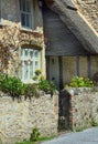 Traditional stone cottage with thatch roof Royalty Free Stock Photo