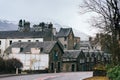 Traditional stone houses in a row along the road in the Tarbet v