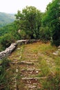 Traditional stone-made footwalk in Zagoria area Royalty Free Stock Photo