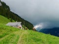Traditional Stone Mountain hut in the Swiss Alps. Alpstein, Switzerland. Royalty Free Stock Photo