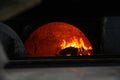 Traditional stone oven with burning wood inside Royalty Free Stock Photo