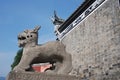 Traditional stone sculpture in front of temple in Sandouping Royalty Free Stock Photo