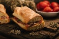 Traditional street food of Sicily, Italy. Pane cunzato on wooden table Royalty Free Stock Photo