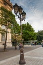 Traditional Street lantern. View of beautiful wrought iron street lamps in the streets of Paris City, France