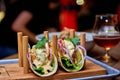 Traditional street mexican pork tacos with beef, tomatoes, avocado, chilli in yellow corn tortilla Royalty Free Stock Photo