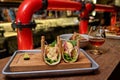 Traditional street mexican pork tacos with beef, tomatoes, avocado, chilli in yellow corn tortilla Royalty Free Stock Photo