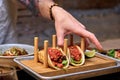 Traditional street mexican pork tacos with beef, tomatoes, avocado, chilli in yellow corn tortilla Royalty Free Stock Photo