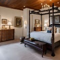 13 A traditional-style bedroom with a mix of wooden and floral finishes, a classic four-poster bed, and a mix of patterned and s