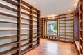 Traditional style library with built-in bookshelves