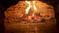 Wood fired oven. Flares of fire rising in the oven. Traditional style wood fired oven. Royalty Free Stock Photo