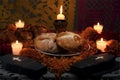 Traditional sugary bread of the dead, celebrating Dia de Muertos with cempasuchilt flowers and cardboard atudes