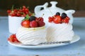 Traditional summer dessert pavlova with berries