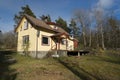 Traditional Swedish house in forest near Horred, Sweden.