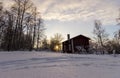 Traditional Swedish House in Winter Sunset Royalty Free Stock Photo