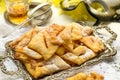 Traditional sweet crisp Angel wings with powdered sugar and rum