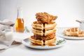 Traditional sweet and savory American dish of crunchy fried chicken and waffles drizzled with maple syrup. Hearty comfort food Royalty Free Stock Photo