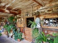 Traditional Swiss farm house with plants and decorative objects. St. Antoenien, Grisons, Switzerland.