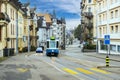 Traditional Swiss houses in the old town village.Tram way on street. Tram station. Royalty Free Stock Photo