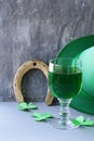 Traditional symbols for Patrick's Day - green beer, horseshoe Royalty Free Stock Photo