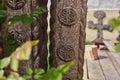 Traditional symbols on a wooden gate