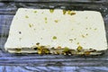 Traditional tahini halva with pistachios or Halawa Tahiniya, the primary ingredients in this confection are sesame butter or paste