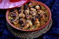 Traditional Tajine Berber Dish Made with Chicken Legs, couscous or rice Royalty Free Stock Photo