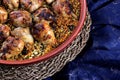 Traditional Tajine Berber Dish Made with Chicken Legs, couscous or rice Royalty Free Stock Photo